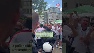 German police officer who is spitting image of Gareth Southgate gets serenaded by England fans [upl. by Diad827]