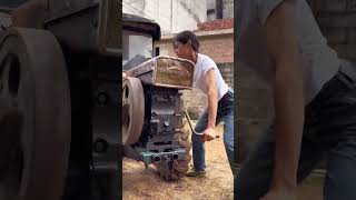 Starting process of a handcranked diesel engine [upl. by Kilah]