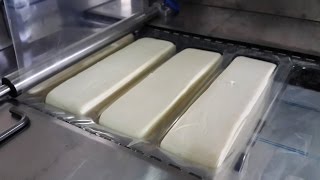 APACK perFORMA Thermoforming CHEESE  Hellim  Dairy packaging [upl. by Kathlene]