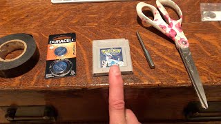 Replacing the CR2025 Watch Battery in Pokemon Silver Game Cartridge [upl. by Ydissahc]