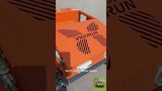 remote operated track trimmer made by Vigorun TechVigorun radio controlled rubber track lawnmower [upl. by Kassi]