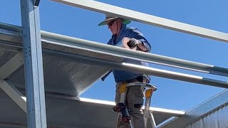 DIY Insulation  OwnerBuilders Insulating Our Steel Frame American Barn Style Shed Roof  Part 1 [upl. by Garrik339]