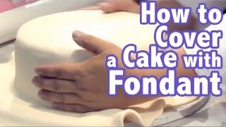 How to cover a cake with Rolled Fondant FondX  Cake Tutorials [upl. by Lander]