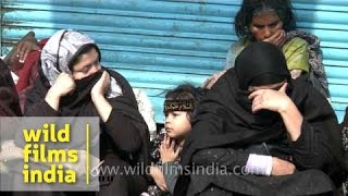 Shia women cry as the Muharram procession passes through [upl. by Ttegirb2]