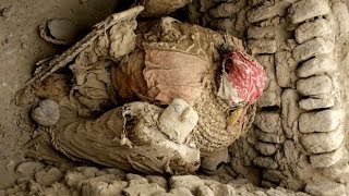 Two 1000YearOld Mummies Unearthed In Peru [upl. by Nnaecyoj]