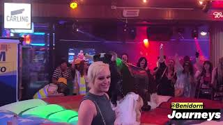 new Pretty Girl in White Dress Riding on a Bull in Benidorm Mechanical Bull Riding in [upl. by Ankney]