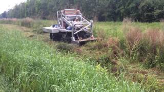 Hydratrek Amphibious Vehicle Video Clearing Brush in Louisiana [upl. by Enailil]